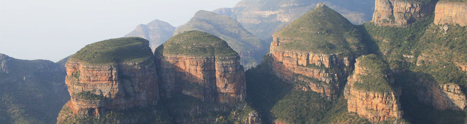 Enticing Africa 3 rondavels